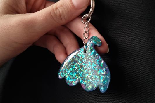 Porte-clé clito à paillettes